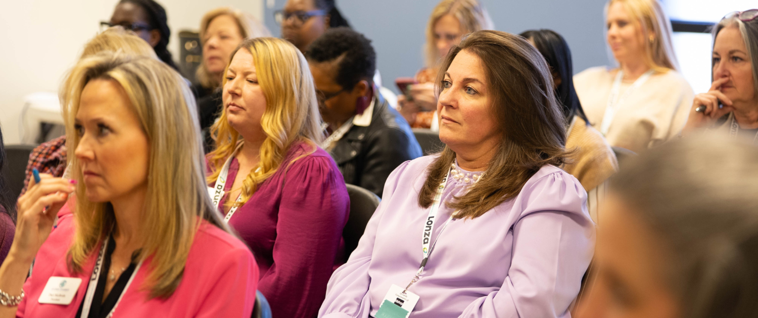 women-at-conference-listening